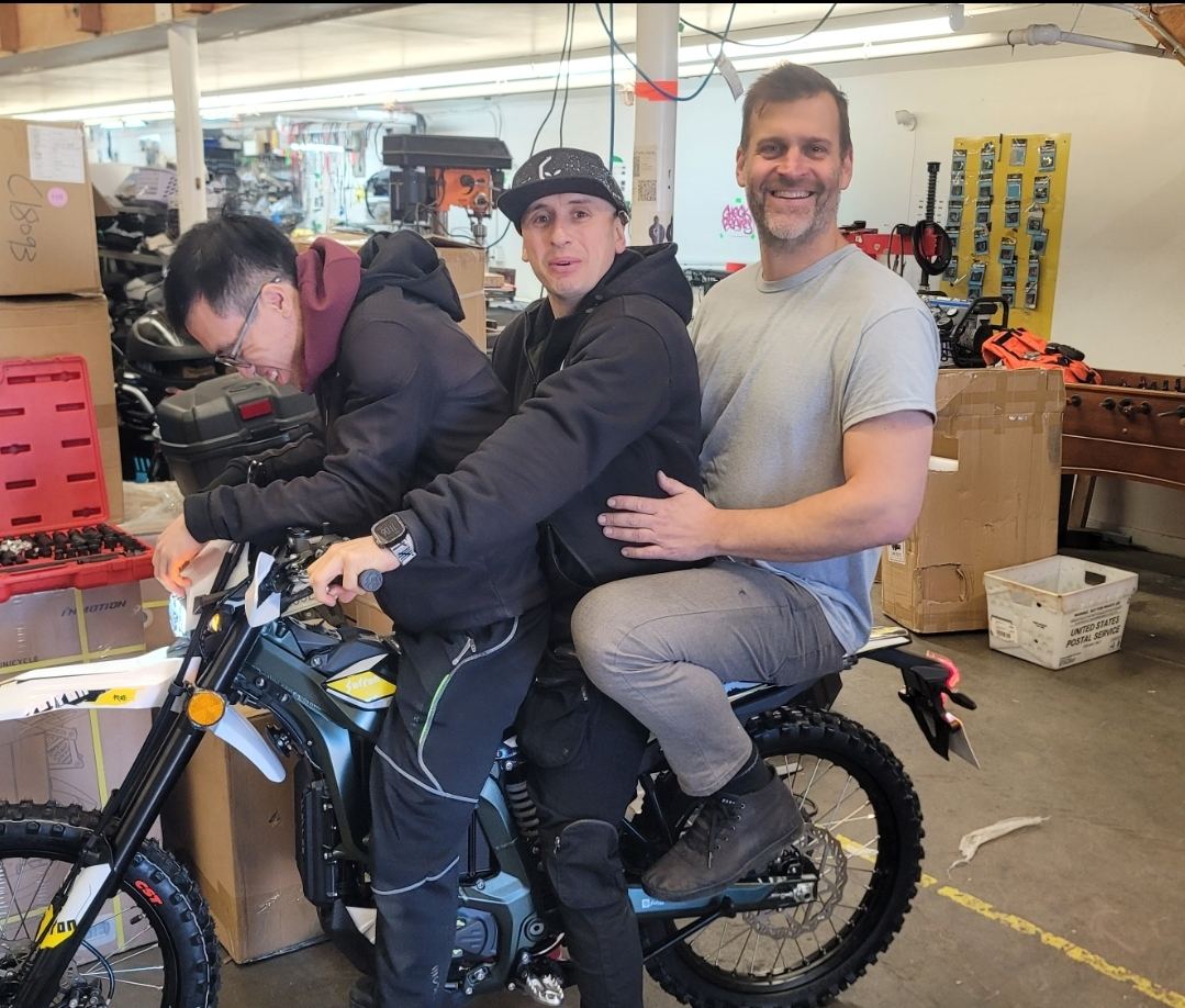 Kevin Graehl (right) with the team at the old shop